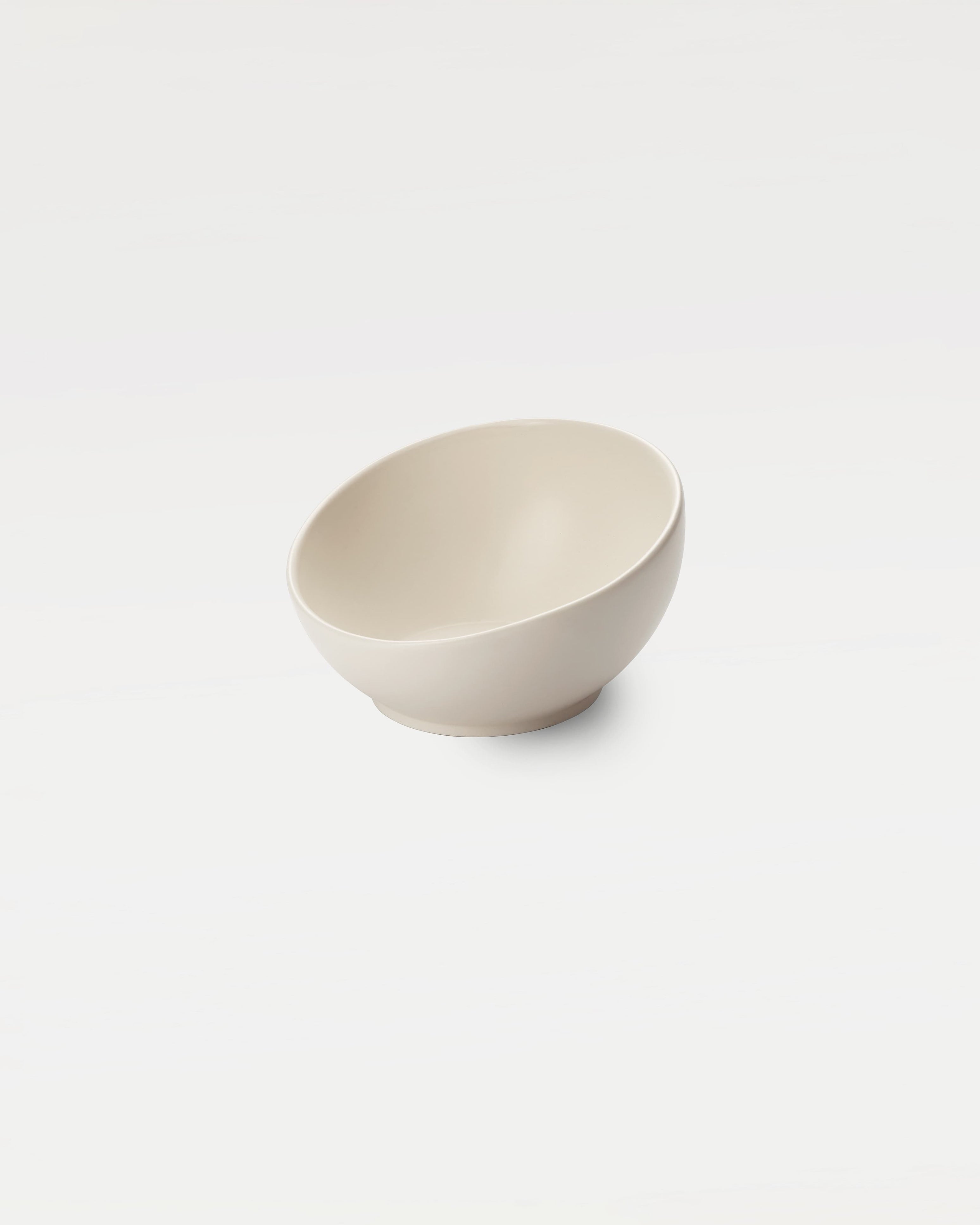 White bowl with sloping rim