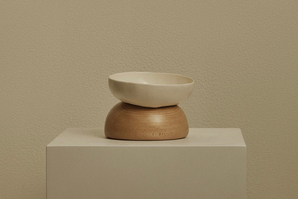 A pebble bowl with its base is placed on a stage
