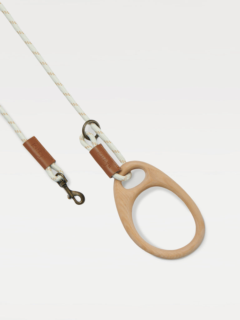 A dog leash for one pets with a ring handle